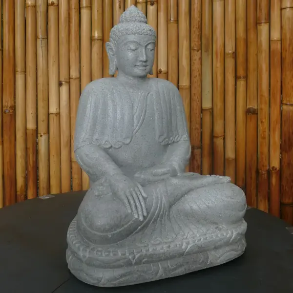 Product image of the product “Seated Buddha made of Riverstone in Bhumisparsha - gesture of touching the earth. 60cm height. ”